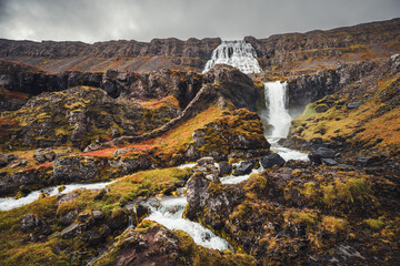Aerial view of a beautiful waterfall in highlands region of Iceland.