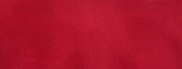 Texture of dark red velvet matte background, macro. Suede ruby fabric with pattern. Seamless wine...