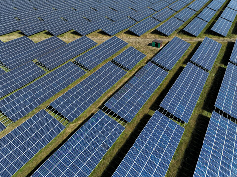 Aerial view of peatland photovoltaic panels at the ecological Solarpark Klein Rheide, Schleswig-Holstein, Germany.