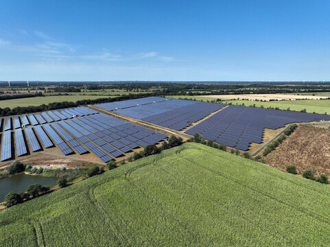 Aerial view of peatland photovoltaic panels at the ecological Solarpark Klein Rheide, Schleswig-Holstein, Germany.