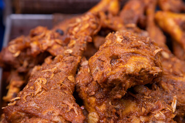 Roasted leg pieces of mutton at a street food market in Dhaka, Bangladesh