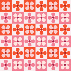 Checkered Pink and orange retro flowers seamless pattern. For textile, stationary and wrapping paper. 