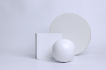 Circle, ball and cube podium with blank space for product mock up
