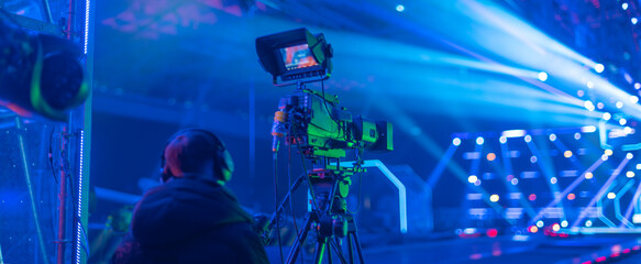 cameraman filming a concert for tv