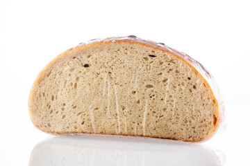 bread sliced on a white background with reflection