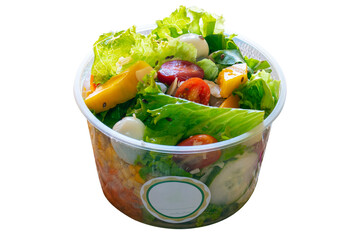 Vegetable salad with fruit in disposable packaging
