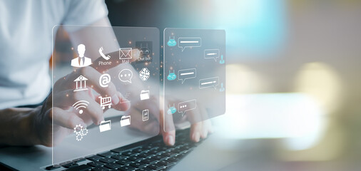 Businessman using laptop computer chatting with chat bot, Chat with AI or Artificial Intelligence technology. chatting communication. Customer using online service with chat bot .chat gpt