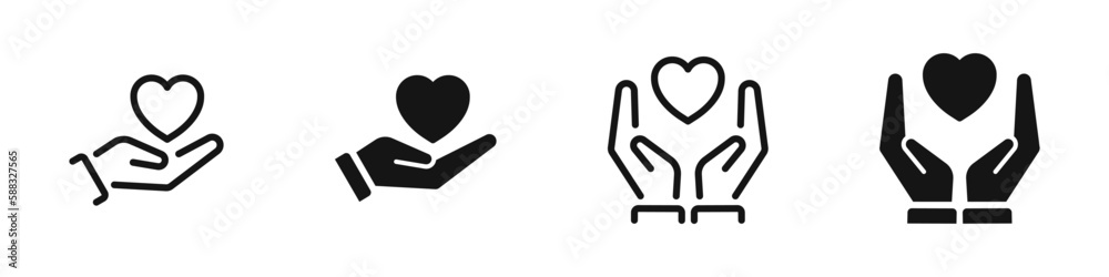 Wall mural Heart in hands symbols. Heart in hand vector icons set. Hands holding heart icon.