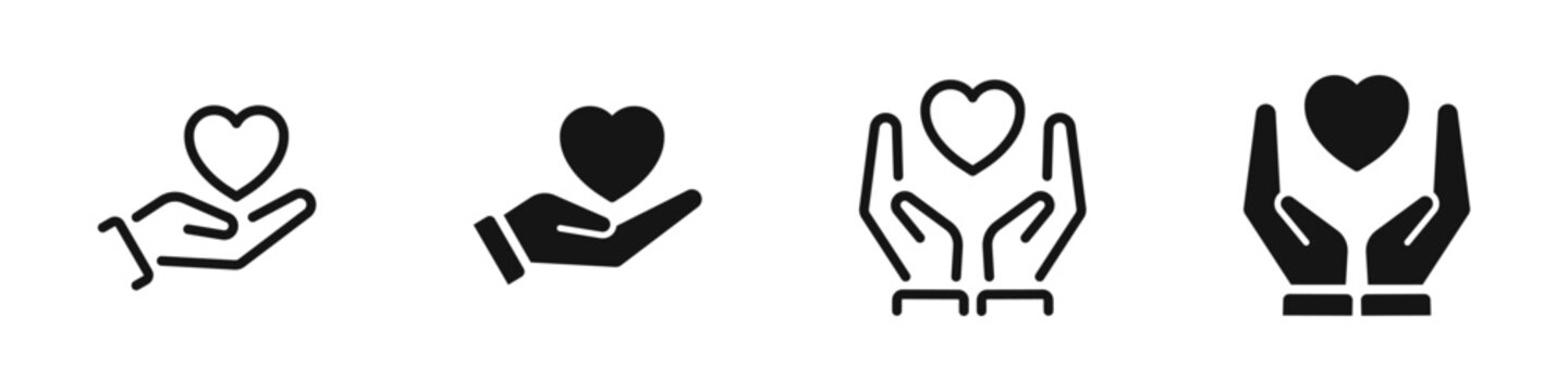 Heart in hands symbols. Heart in hand vector icons set. Hands holding heart icon.