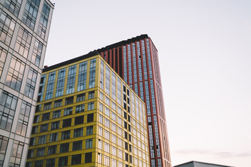 Fototapeta na wymiar High rise buildings under cloudless blue sky