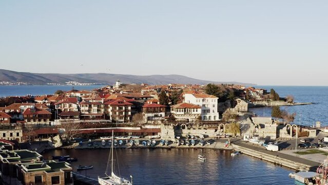 Reveal shot over Nesebar fishing harbour Black Sea coastal resort Bulgaria