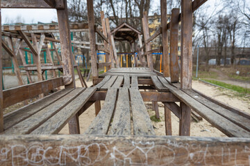 Fototapeta na wymiar Very old wooden playground for children