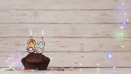 Festive card Happy Birthday with number of burning candles. Beautiful background save space, happy...