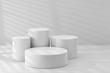 Set of round white podiums with natural daylight and window blinds shadow.