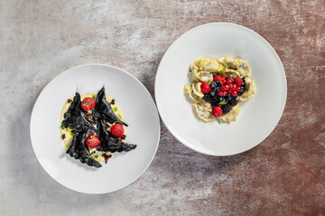 Dumplings with cherries and dumplings with salmon.