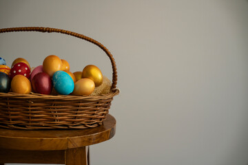 Happy Easter background and template, Basket of easter eggs on a bench Selective focus