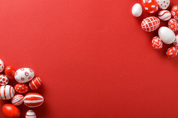 Easter backgrounds, scattered Easter red and white eggs on a bright red background.