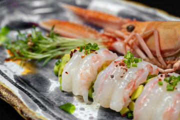 Sashimi from langoustines with avocado