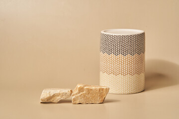 A podium made of natural stone and porcelain on a light background for an empty exhibition for the presentation of your product. Background for cosmetic products, with space to copy.High quality photo