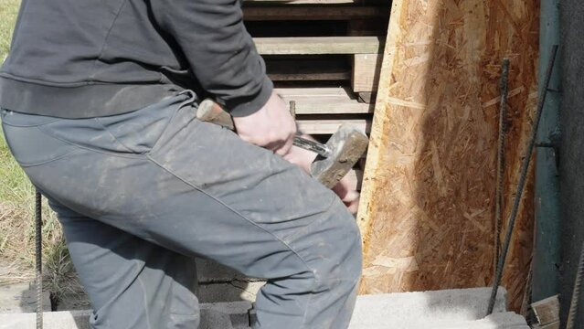 installation of metal fittings in the base plate of the building