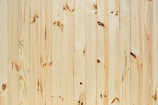 Texture of fresh, narrow, vertical wooden boards. Background backdrop for design.