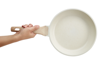 Hand holding a ceramic frying pan isolated on white background. Studio shot