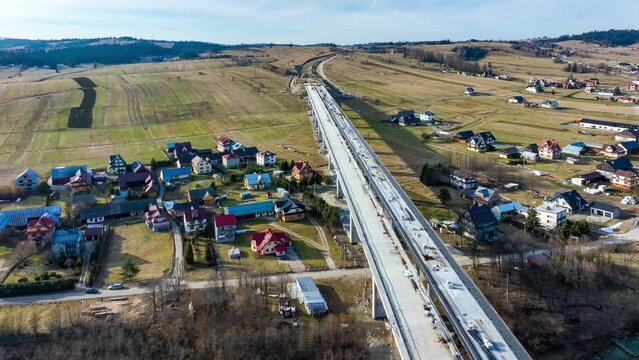 New fragment of highway in construction on Zakopianka road in Poland from Krakow to Zakopane over Klikuszowa village, main place of traffic jams near Nowy Targ. State in March 2023 