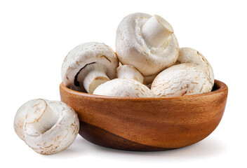 Champignons in a wooden plate close-up on a white. Isolated