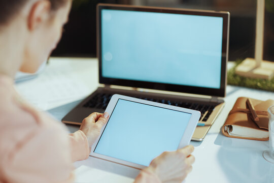 Seen From Behind Modern Woman With Laptop Blank Screen