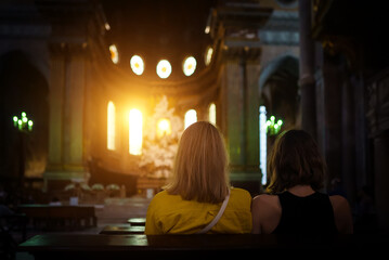 Family in a large Catholic cathedral.