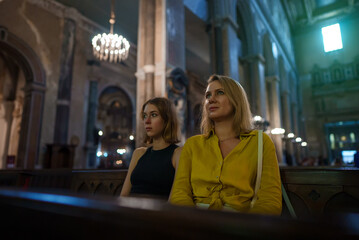 Family in a large Catholic cathedral.