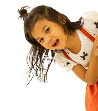 asia cute kid playing peekaboo and smile