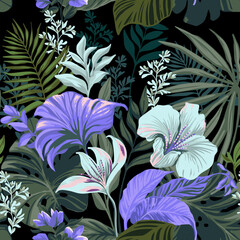 Tropical seamless pattern. Exotic flowers on a black background. - 588381542
