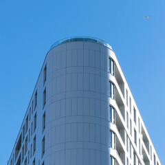 Modern architecture. Tall white buildings with glass windows. Modern city.