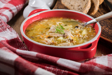 Barley soup with vegetables and chicken.