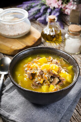 Polish barley soup with vegetables and chicken heart.