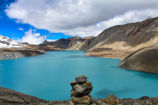 The deep luminescent blue of one of the highest lakes in the world - Tilicho Lake at 4910 meters above sea level on the Annapurna circuit trek  in central Nepal