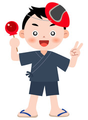 りんご飴を持った甚平の男の子