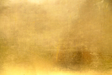golden yellow foil shiny texture background