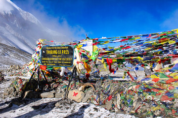 The Thorung La Pass signboard greets trekkers as they reach the high point of the Annapurna Circuit trek at 5416 meters above sea level