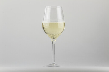 GLASS OF WINE ON A NEUTRAL BACKGROUND