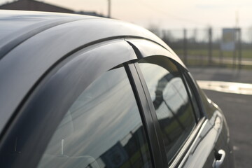 Car accessory, deflectors for side windows of the car. 