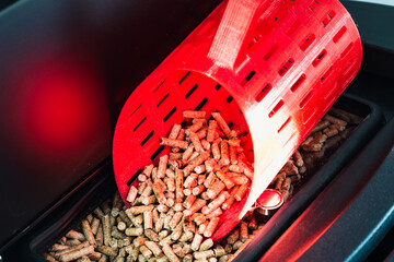 Modern domestic pellet stove, granules stove with 3d printed bucket