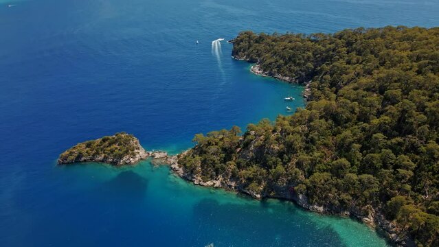 Aerial view of yachts in the blue sea bay at Oludeniz, Turkey. Yachting, luxury vacation