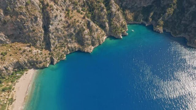 Butterfly Valley is a valley in Fethiye district of Mula Province, southwestern Turkey, which is home to diverse butterfly species.