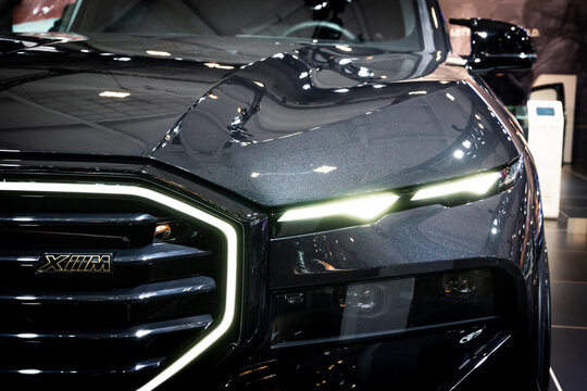 BMW XM Black Sapphire luxury car showcased at the Brussels Autosalon European Motor Show. Brussels, Belgium - January 13, 2023.
