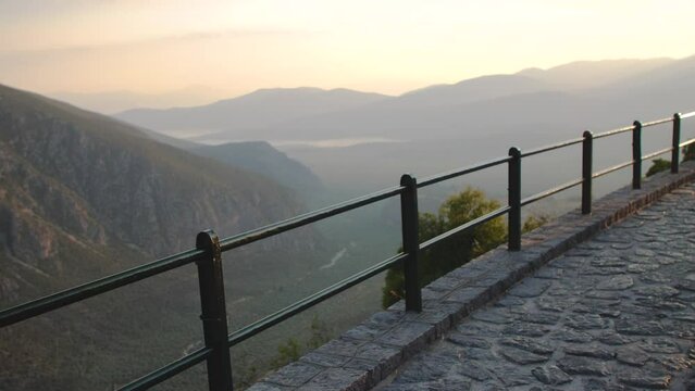 Delphi landscape with mountains from high viewpoint at sunset, Greece.