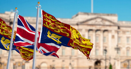 Royal Standard and United Kingdom flags waving in London - obrazy, fototapety, plakaty