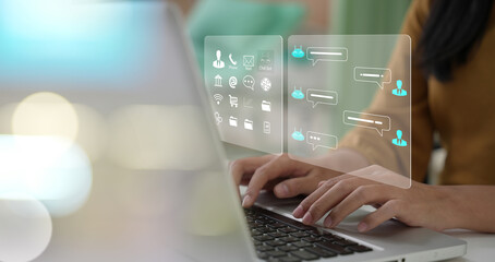 Businessman using laptop computer chatting with chat bot, Chat with AI or Artificial Intelligence technology. chatting communication. Customer using online service with chat bot .chat gpt