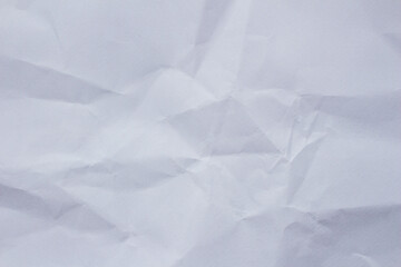 Wrinkled white paper texture or background